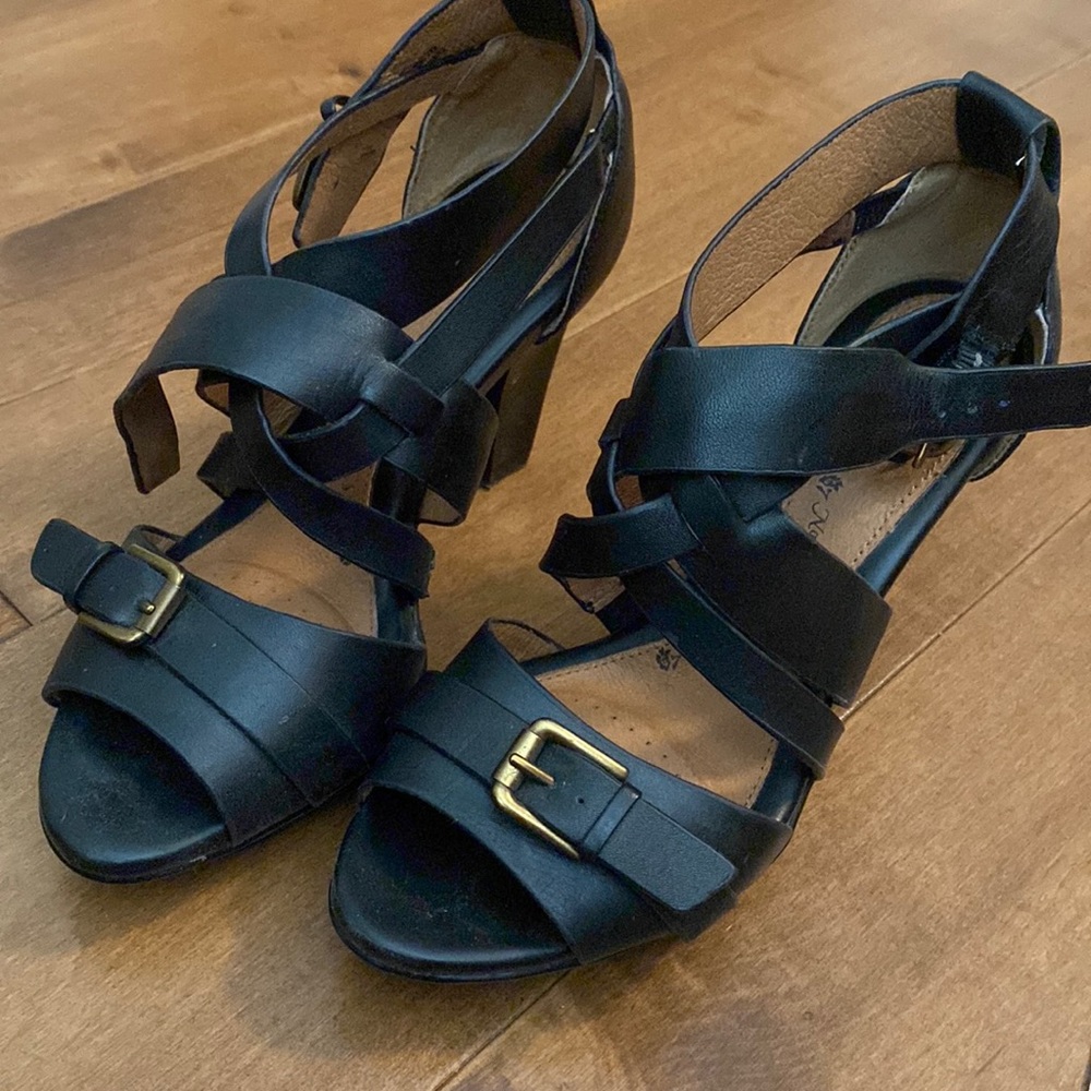 Black leather platform sandals.  Size 7.5 by Sofft.  Only worn a few times